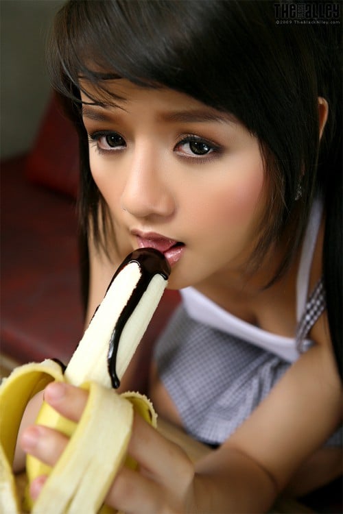 Busty-Shaved-Brunette-Babe-Nancy-Lin-with-Hard-Nipples-Wearing-Braces-Playing-With-Banana-6